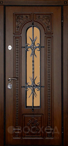 Фото стальная дверь Дверь с ковкой №13 с отделкой Массив дуба